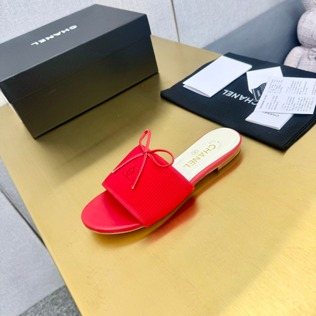 CHANEL BOW SLIPPERS IN CANDY RED LAMBSKIN