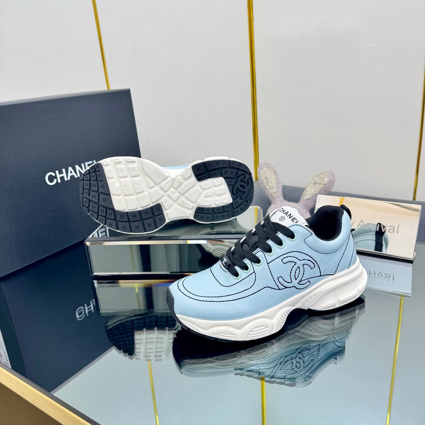 CHANEL TRAINERS SNEAKER IN LIGHT BLUE CALFSKIN WITH BLACK EMBROIDERED